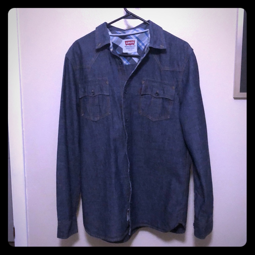 Long sleeve denim shirt in new condition.